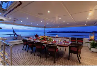 Open-air dining on a very spacious upper deck aft