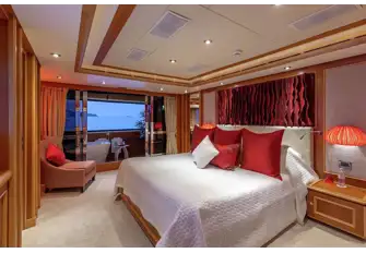 The owner's suite forward on the main deck has a free-standing bathtub on the private balcony to starboard