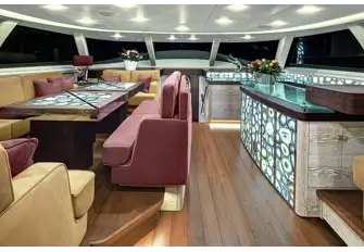 The deck saloon has panoramic views and back-lit agate bar