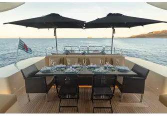 Al fresco dining forward of the generous sunpad aft