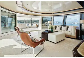 The owner's lounge overlooks a private terrace with jacuzzi, sunpads and an intimate dining area