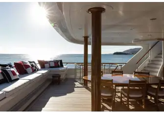 Open-air dining on the bridge deck aft