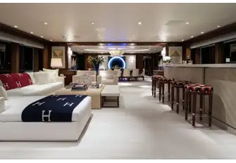 There is formal dining forward in the main saloon and panels in the bar slide back to reveal a large TV for movie nights