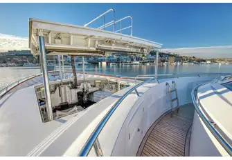 One of the yacht's two tenders shows under the forward coachroof