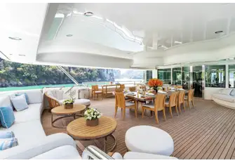 Open-air dining on the BBQ deck aft, with a second option on the bridge deck aft