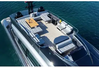 The flybridge has a helm station forward and lounging aft