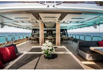 The bridge deck aft is a spacious entertainment space with dining forward and lounging aft