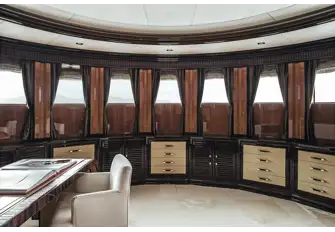 From the owner's bedroom, steps lead up to a private space that serves as an office, TV room, library and observation lounge