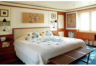The owner's suite is forward on the main deck and has private deck access as well as an entrance in the main lobby