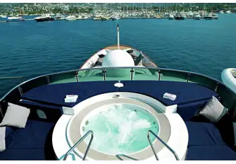 The forward sun deck has a sunpad-flanked jacuzzi and a sit-up wet bar