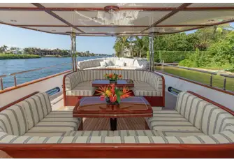 The shaded main deck aft lounge is a great alternative to the cool comfort of the main saloon