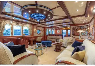 The main saloon is convivality itself. Pick up an old fashioned from the bar and settle into a seat