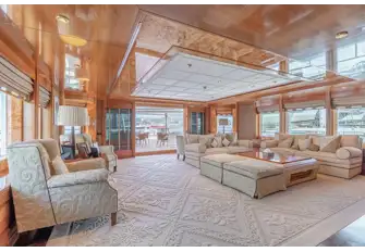 The sky lounge is well illuminated by natural light through large windows