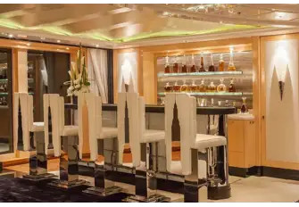The upper deck's skyscraper bar services the lounge in 1920s Manhattan style