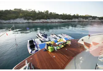The large swim platform adjacent to the tender and toy garage