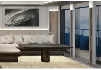 Full-height glazing connects guests to their surroundings, as seen here in the full-beam main deck VIP suite, which has its own balcony