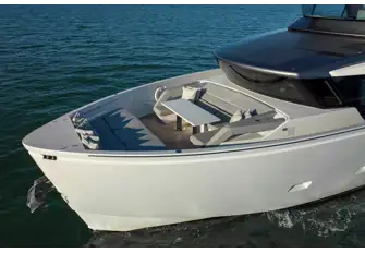 Walkaround sidedecks lead forward to a second lounge area and sunpads