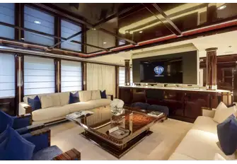 Forward of the jaw-dropping bar is a lounge area that doubles as a cinema with a huge drop-down screen. There is formal dining forward