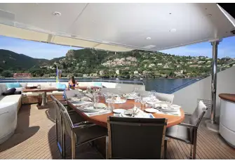 The upper deck aft has open-air dining with two buffet bars and lounge seating aft