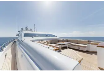 Walkaround sidedecks lead to a foredeck lounge and huge sunpads