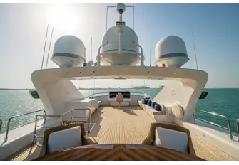 BASH IV's flybridge with dining aft, the bridge forward and plenty of versatile space between