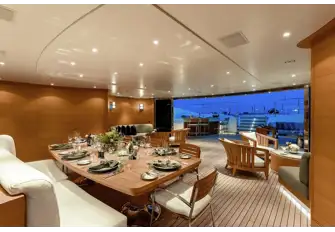 A huge sun deck has a pool, bar and lounge forward, a touch-and-go helipad aft and a lounge and dining area that can be climate controlled