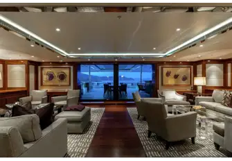 The upper deck sky lounge opens onto a large aft deck entertaining space