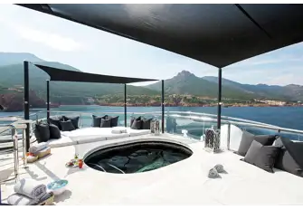 Melt into SILVER ANGEL's raised jacuzzi after a fun-packed day of watersports