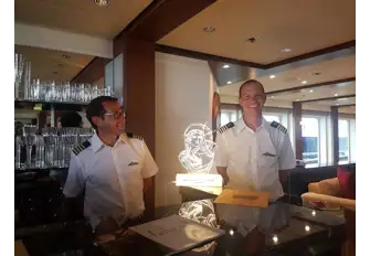 SLIPSTREAM's Captains Phil (left) and Steve with the 2018 Yachts du Coeur award