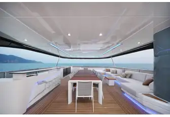 The forward section of the sun deck, with dining, bar and lounge, is shaded by the hardtop