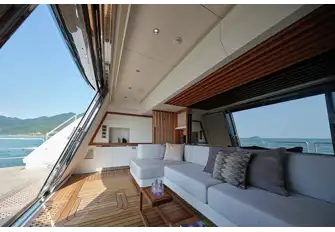 Sliding glass doors reveal the air-conditioned, sea-level beach club cabana