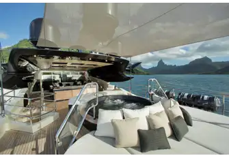 Flybridge sun deck covered seating and jacuzzi