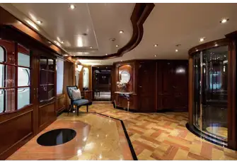 She has grand style, as seen here in the main deck elevator lobby, but she's never challenging