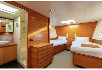 The owner's suite in the forecabin, with two outsize singles that can convert into a huge double