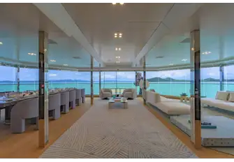 All the privacy glass slides away to leave a shaded terrace with glass bulwarks to preserve the view