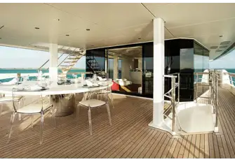 Open air dining on the upper deck aft
