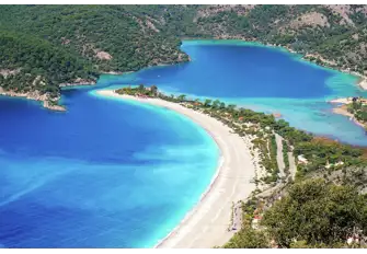 Oludeniz beach in south west Turkey is a great place to drop anchor and paddle into the bay