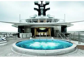 The large circular pool on the vast upper deck aft