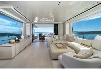An open-plan main saloon has huge windows