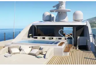 A large sun deck has a jacuzzi forward and a lounge and massage room beneath the hardtop