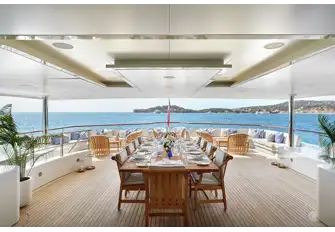 Open air dining on the upper deck aft