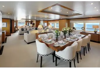 Formal dining area and lounge looking aft in the main saloon