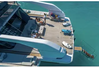 The huge swim platform serves as tender and toy stowage underway, recovered with a cleverly concealed deck crane