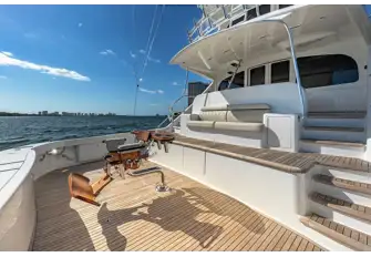 The teak-decked fishing cockpit, where all the action happens, and open-air dining just up the steps