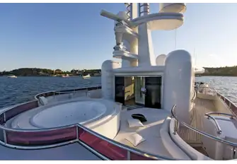 The jacuzzi forward on the sun deck and the gym under the hardtop