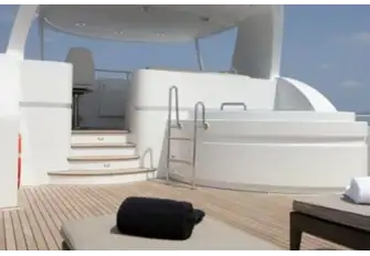 An observation lounge and flybridge forward and a jacuzzi at the foot of the steps