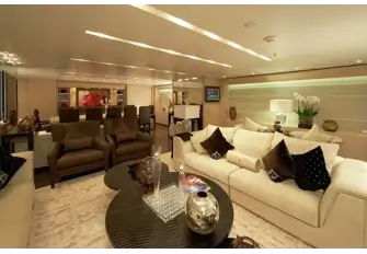 The main saloon with a lounge set to port and formal dining forward