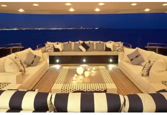 A spacious lounge on the main deck aft
