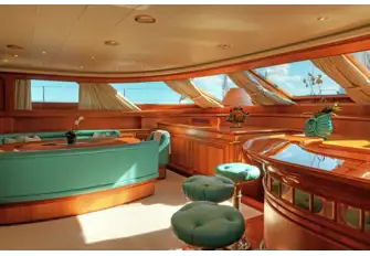Formal dining to port and a sit-up bar to starboard, both with great views
