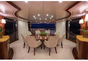 Looking aft in the upper deck dining area, surrounded by glass